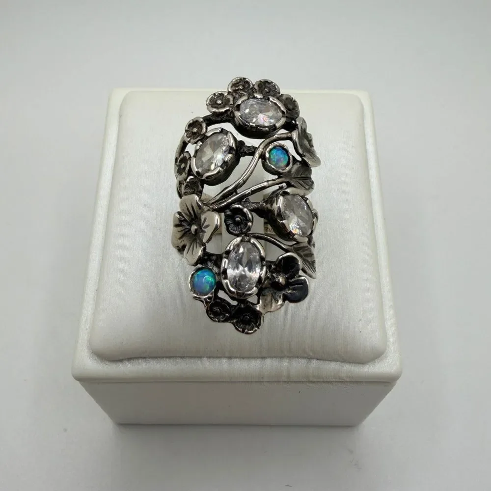 Stunning oval cut‎ faceted cz diamond and Ersatz opal statement 925 floral ring!